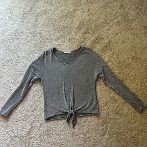 Caution to the Wind - black and white long sleeve shirt with a tie at bottom